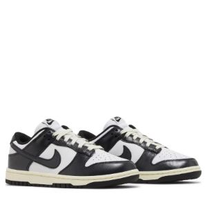 Nike Dunk Low Vintage Panda (W) sold by PLUS