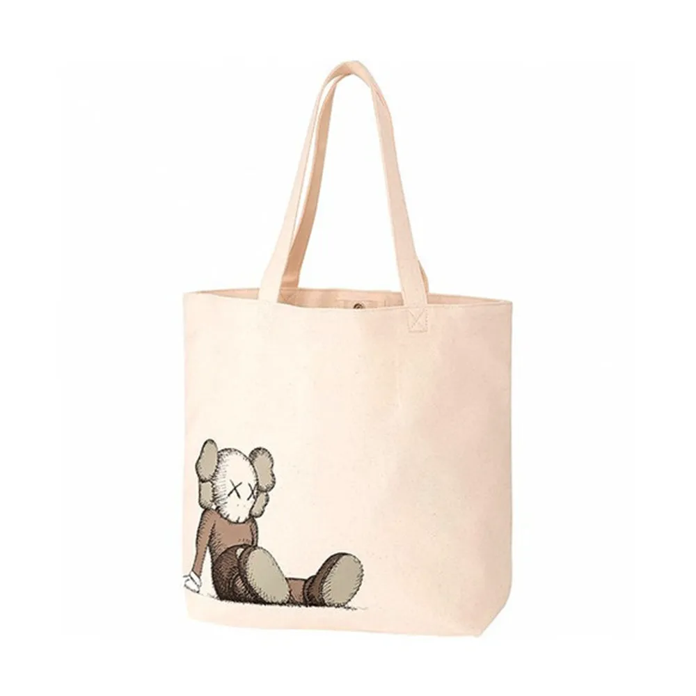 KAWS x Uniqlo Holiday Tote Bag Natural sold by PLUS