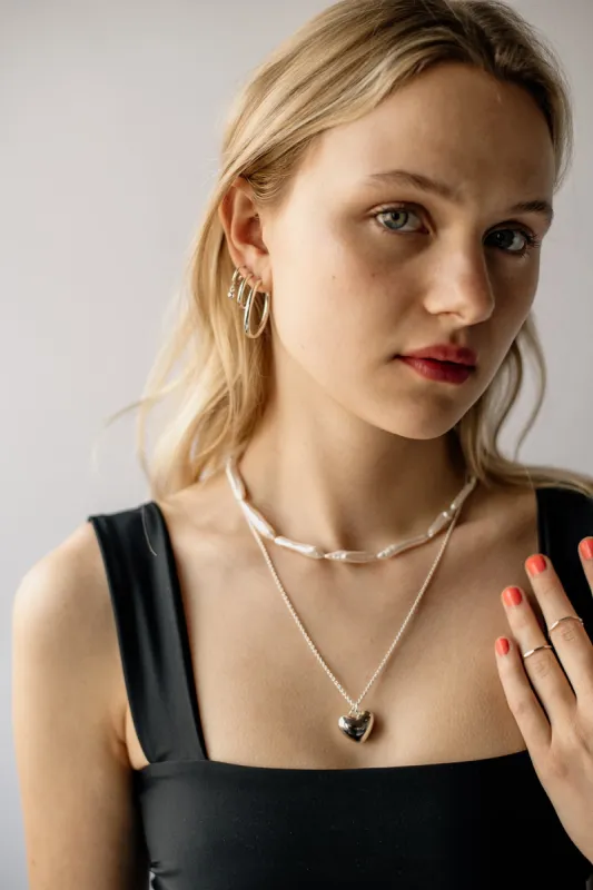 Bold Puffy Heart Necklace, Silver sold by Naomi Murrell