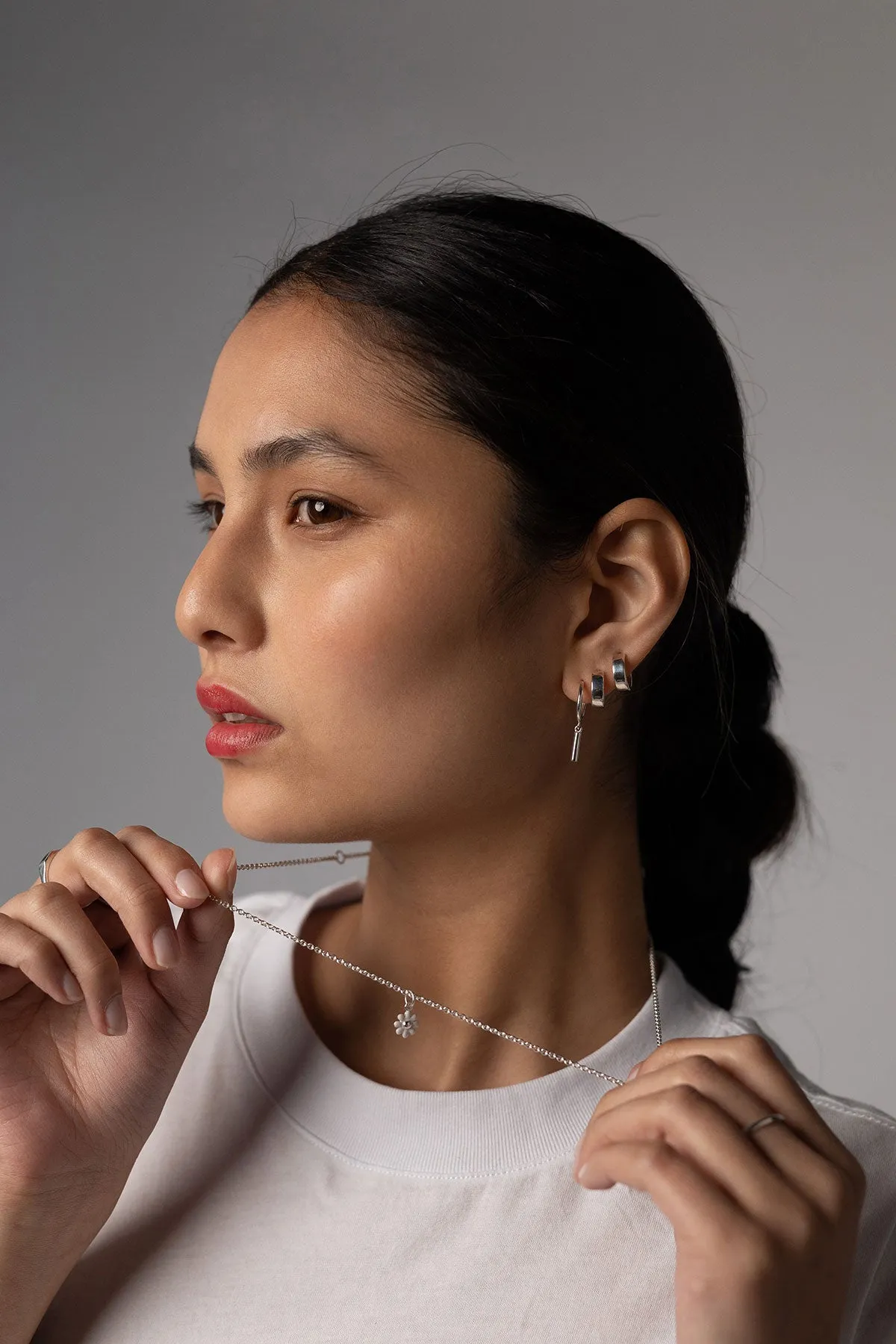 Daisy Cakes Charm Necklace, Sterling Silver sold by Naomi Murrell product image thumbnail 2