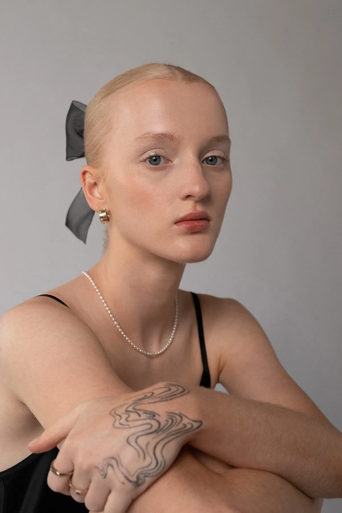 Neptune Huggies, Gold Vermeil sold by Naomi Murrell