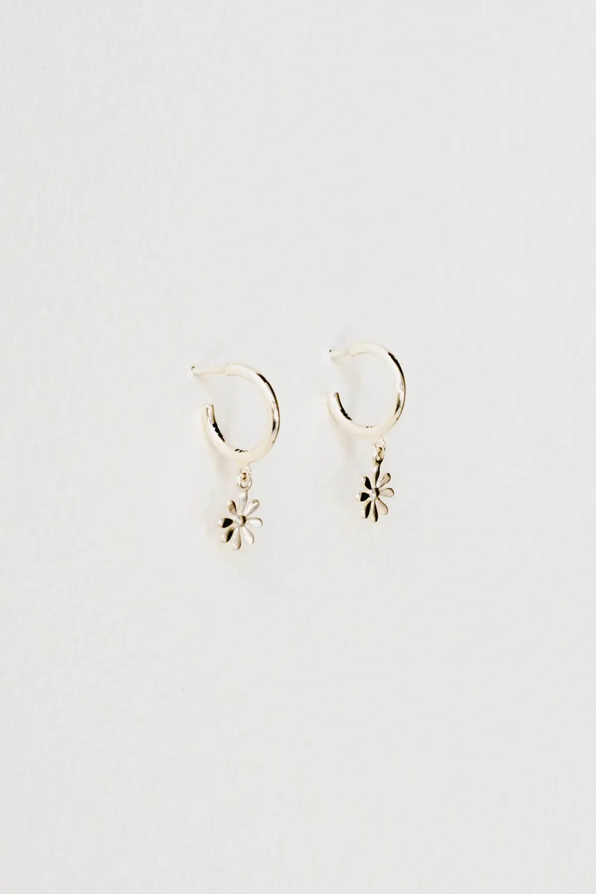 Daisy Charm Hoops, Sterling Silver sold by Naomi Murrell