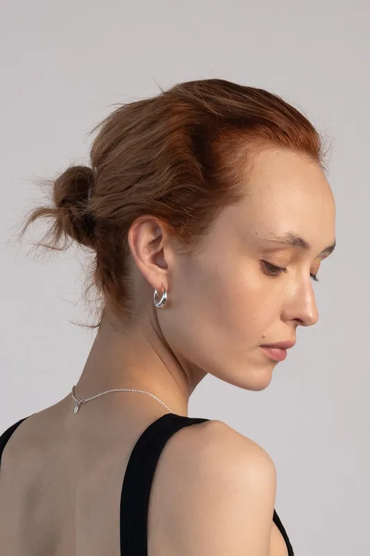 Crescent Hoops, Sterling Silver made by Naomi Murrell