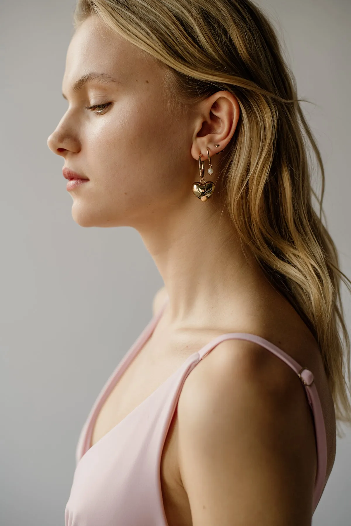 Bold Puffy Heart Hoops, Golden Brass sold by Naomi Murrell