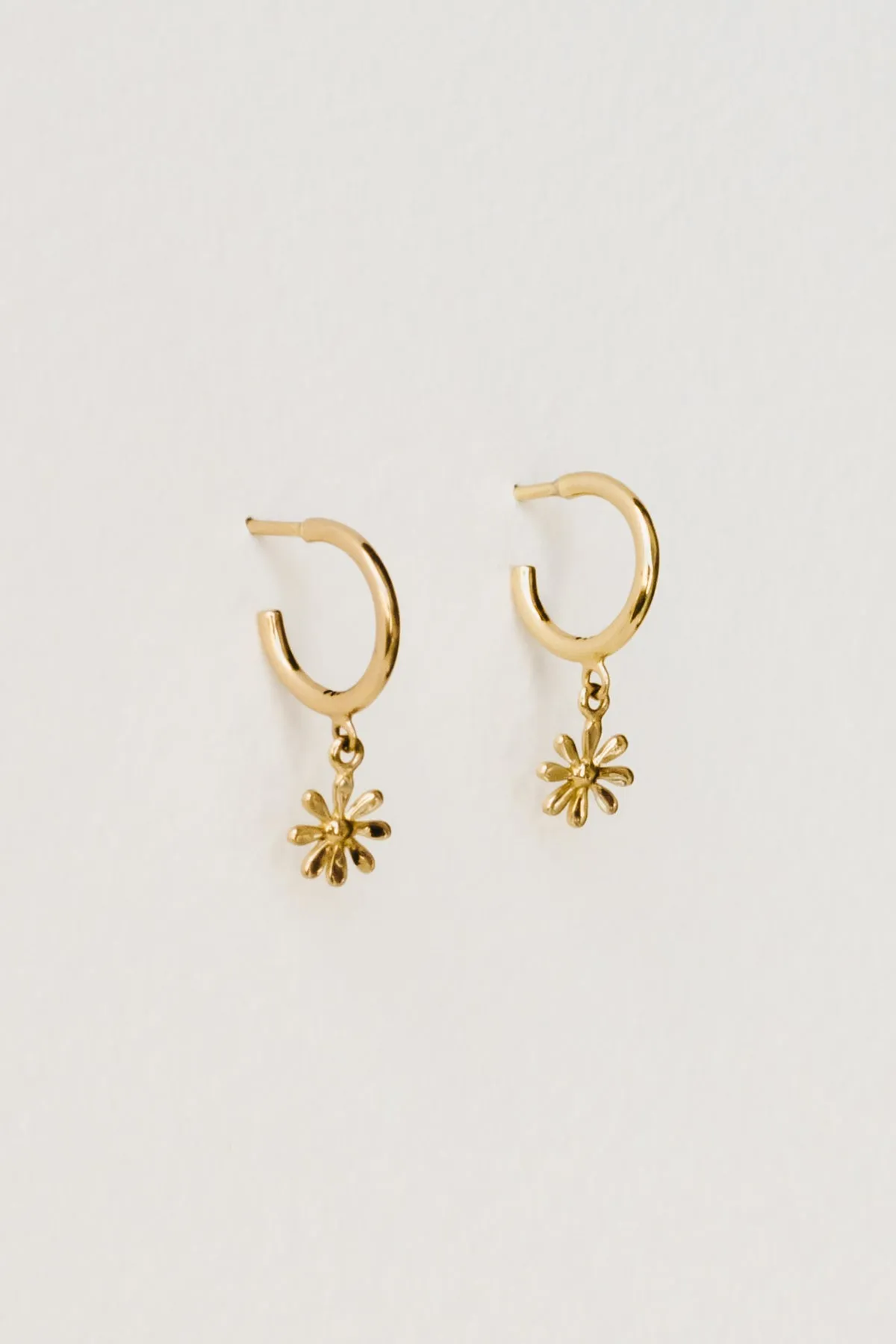 Daisy Charm Hoops, Golden Brass sold by Naomi Murrell product image thumbnail 5