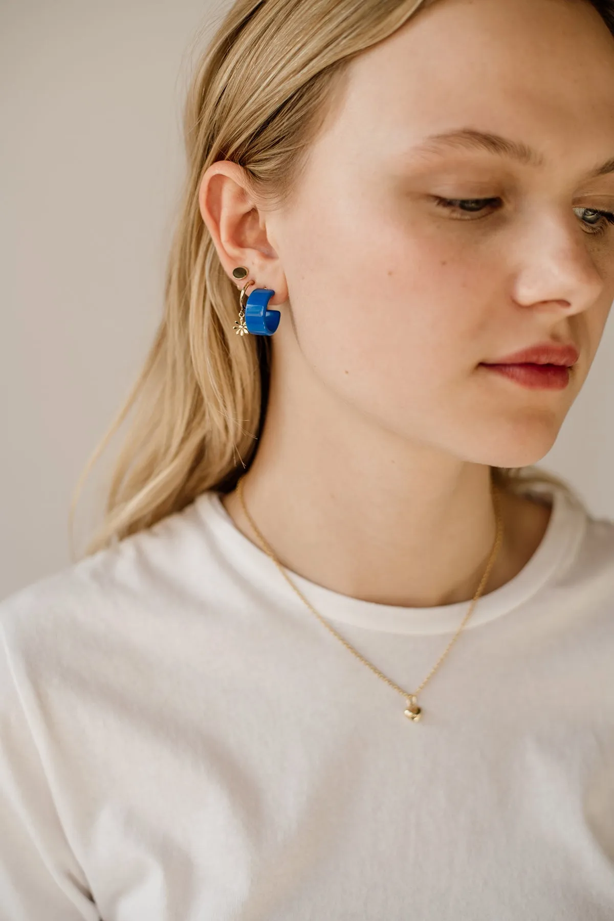 Daisy Charm Hoops, Golden Brass sold by Naomi Murrell product image thumbnail 2