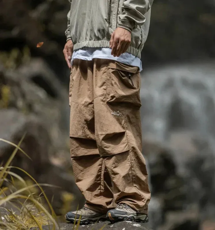 Men's Cargo Trousers - Elasticated Waist and Flap Side Pockets sold by Elvoria London