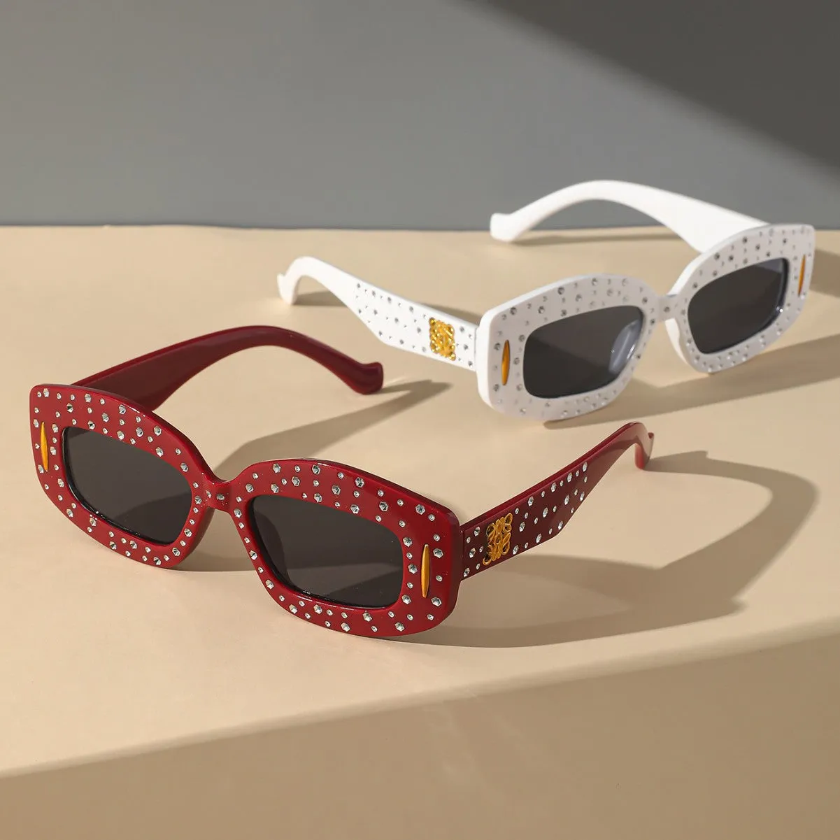 Sparkle & Shade:Sunglasses sold by Deluxxie