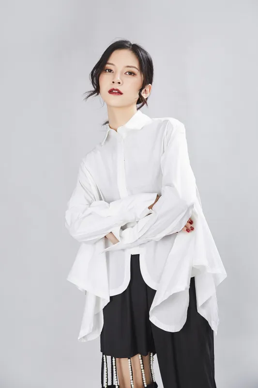 Sonoya Lapel Long Sleeve Irregular Hem Shirt by Marigold Shadows sold by Deluxxie
