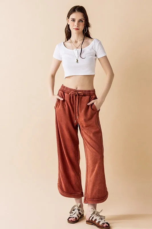 Dolphin Tail Wide Leg Mineral Washed Pants sold by Deluxxie