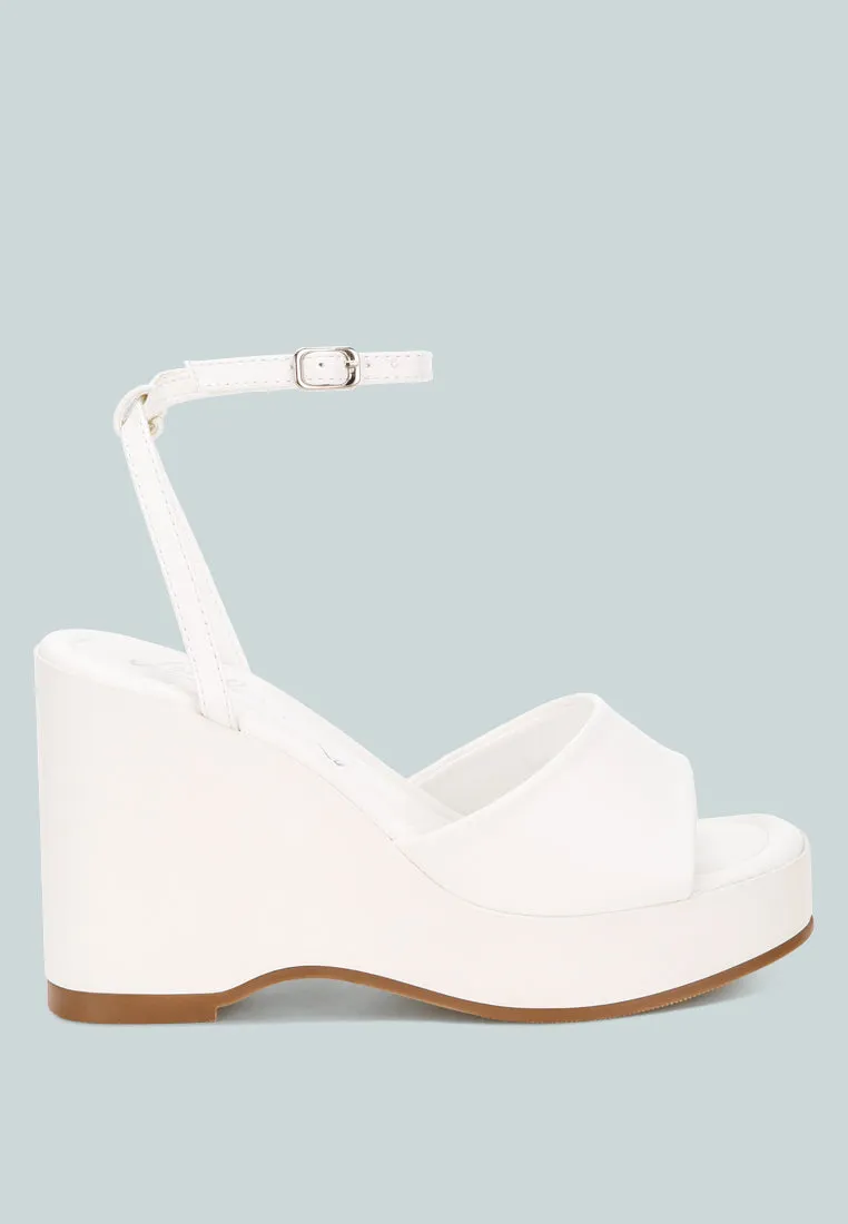 Sangria Solid Platform Faux Leather Wedges sold by Deluxxie