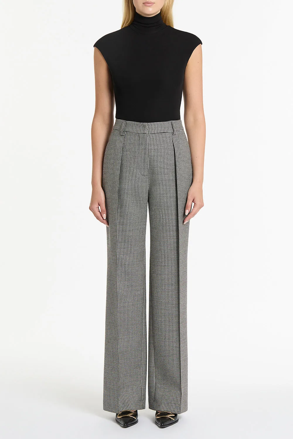 BLACK MATTE JERSEY EXTENDED POLO sold by Carla Zampatti