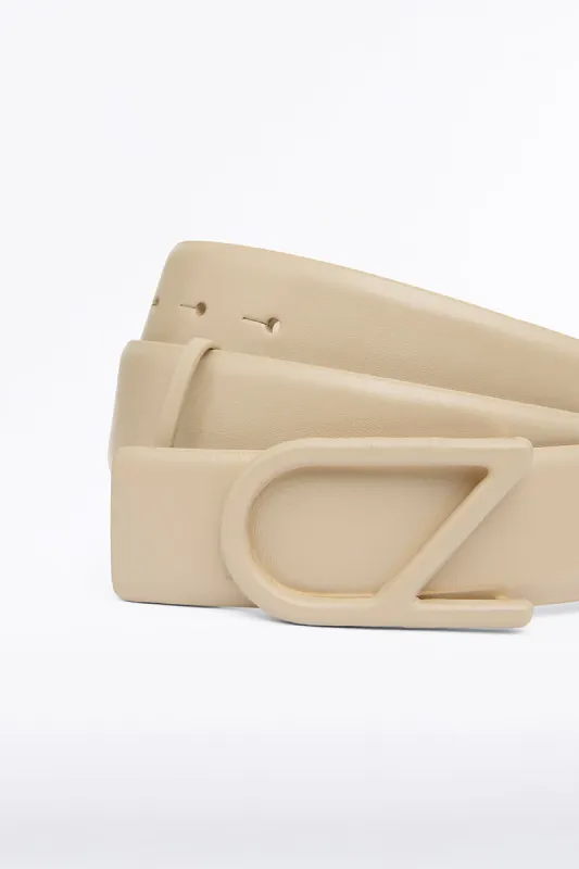 NUDE CZ LOGO COVERED BELT sold by Carla Zampatti