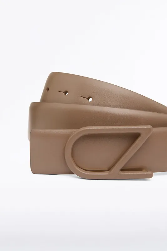 TAN CZ LOGO COVERED BELT sold by Carla Zampatti