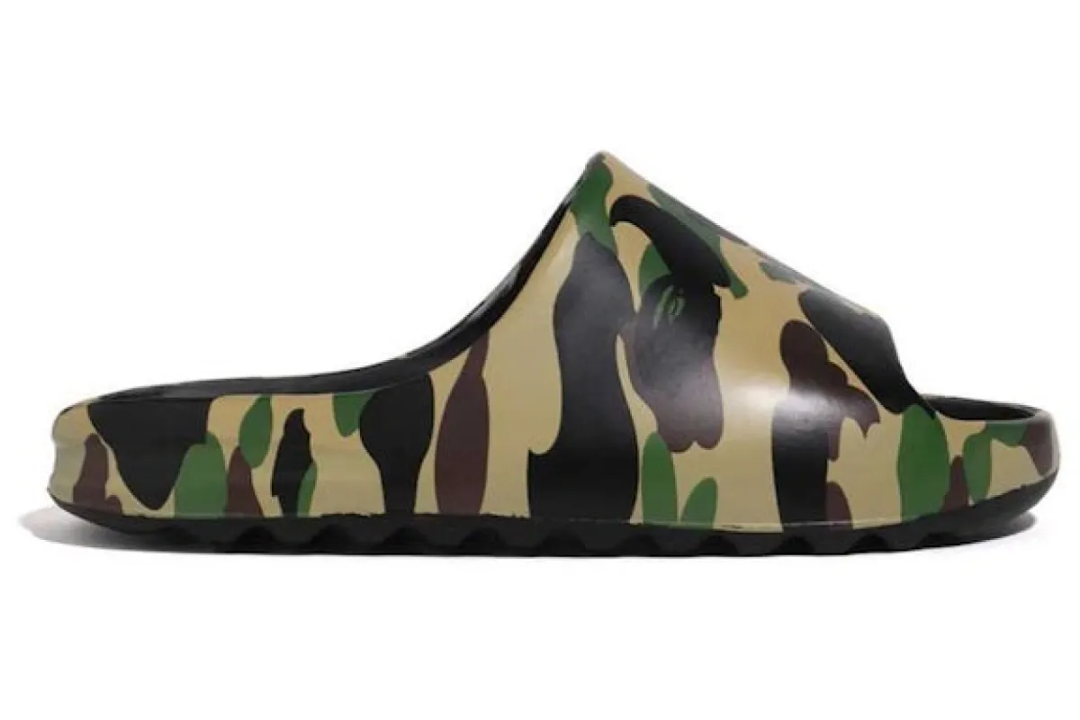 A Bathing Ape 1 st Camo Slide Yellow sold by Addict Sneakers