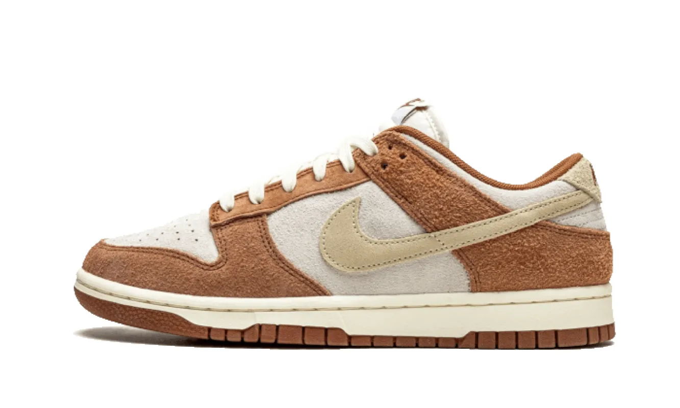 Nike Dunk Low Medium Curry sold by Addict Sneakers