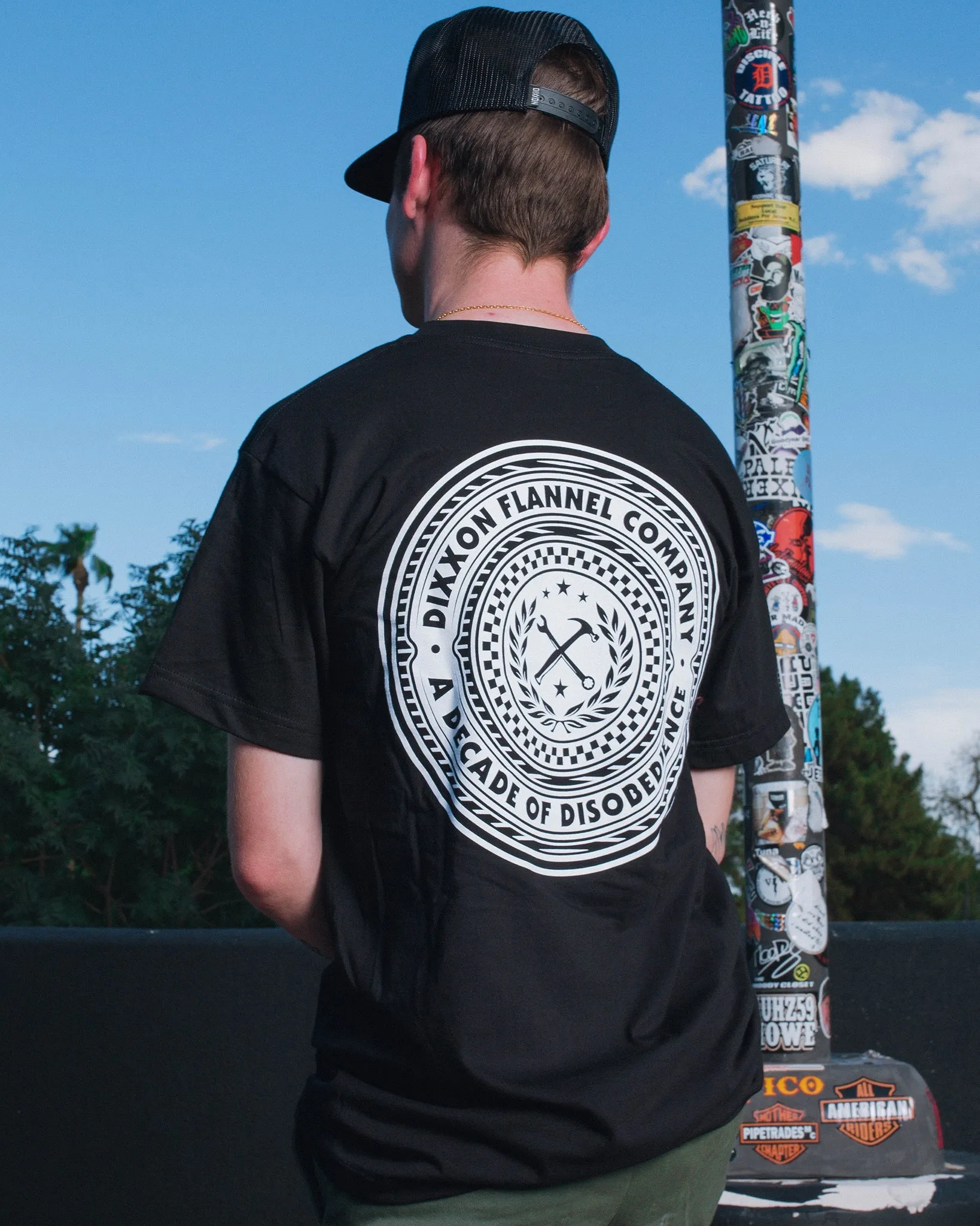 Disobedience Badge T-Shirt sold by Dixxon