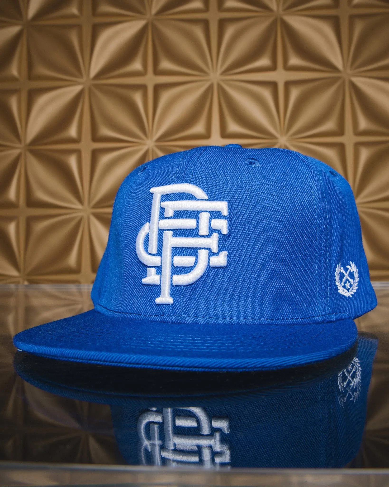 Badge Flat Bill Snapback - Blue sold by Dixxon