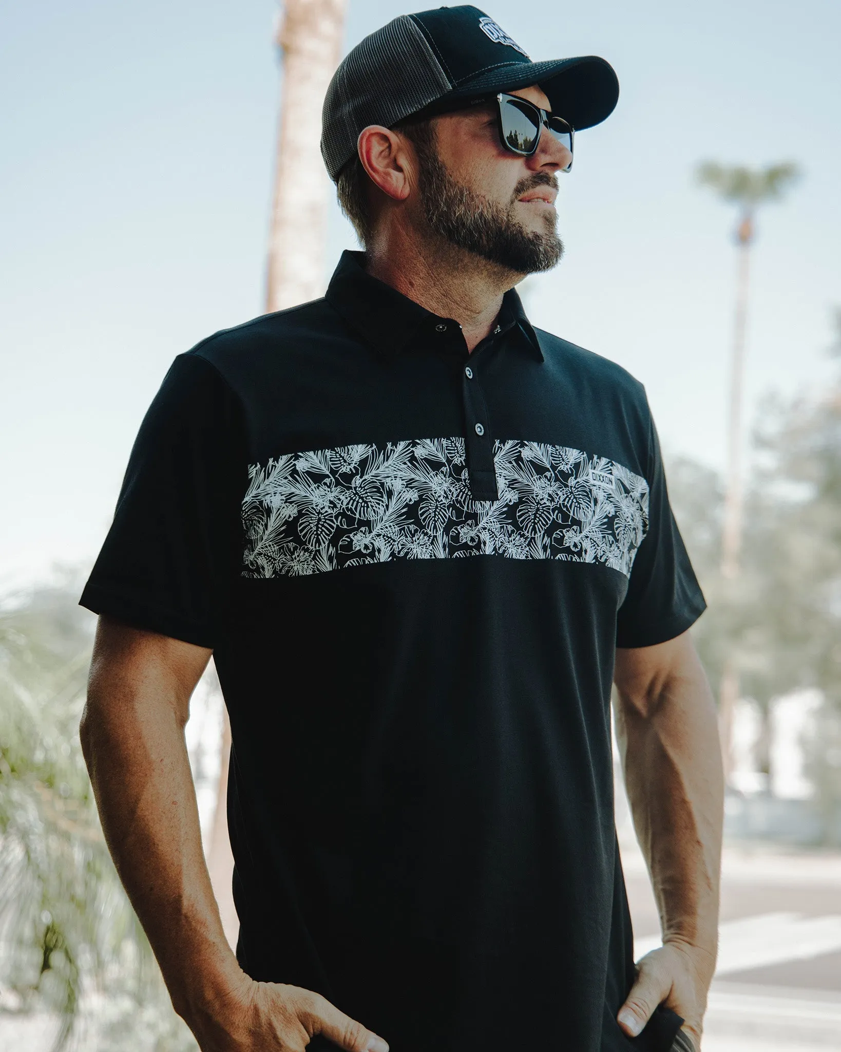 White & Black Floral Premium Polo - Black sold by Dixxon