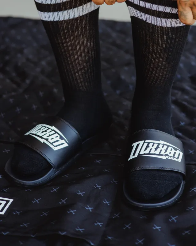 Bolt Slides - White & Black sold by Dixxon