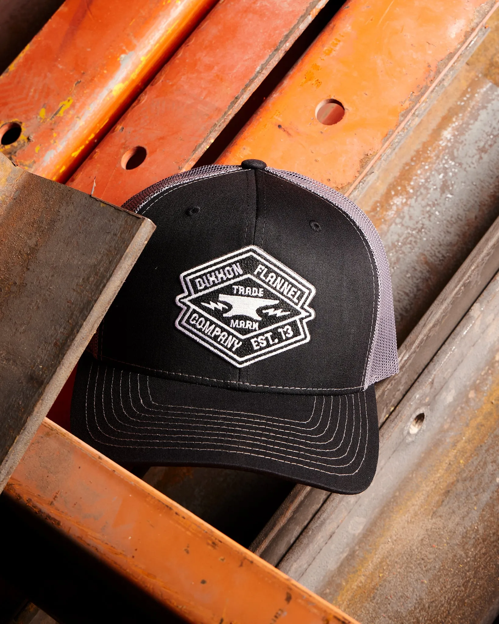 Forged Curved Bill Trucker Snapback sold by Dixxon