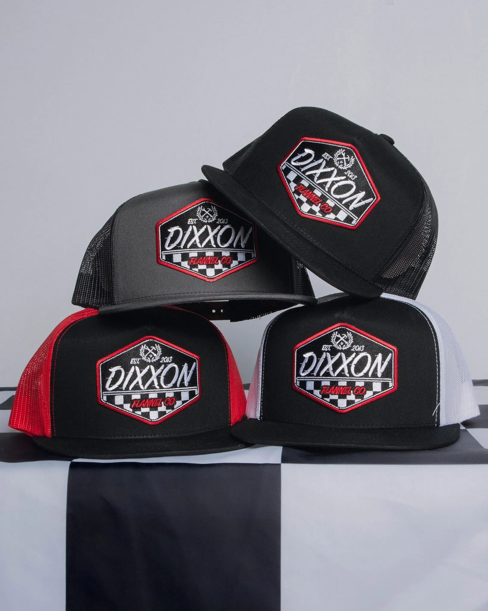 Speed Flat Bill Trucker Snapback sold by Dixxon