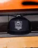 Shield Flat Bill Trucker Snapback sold by Dixxon