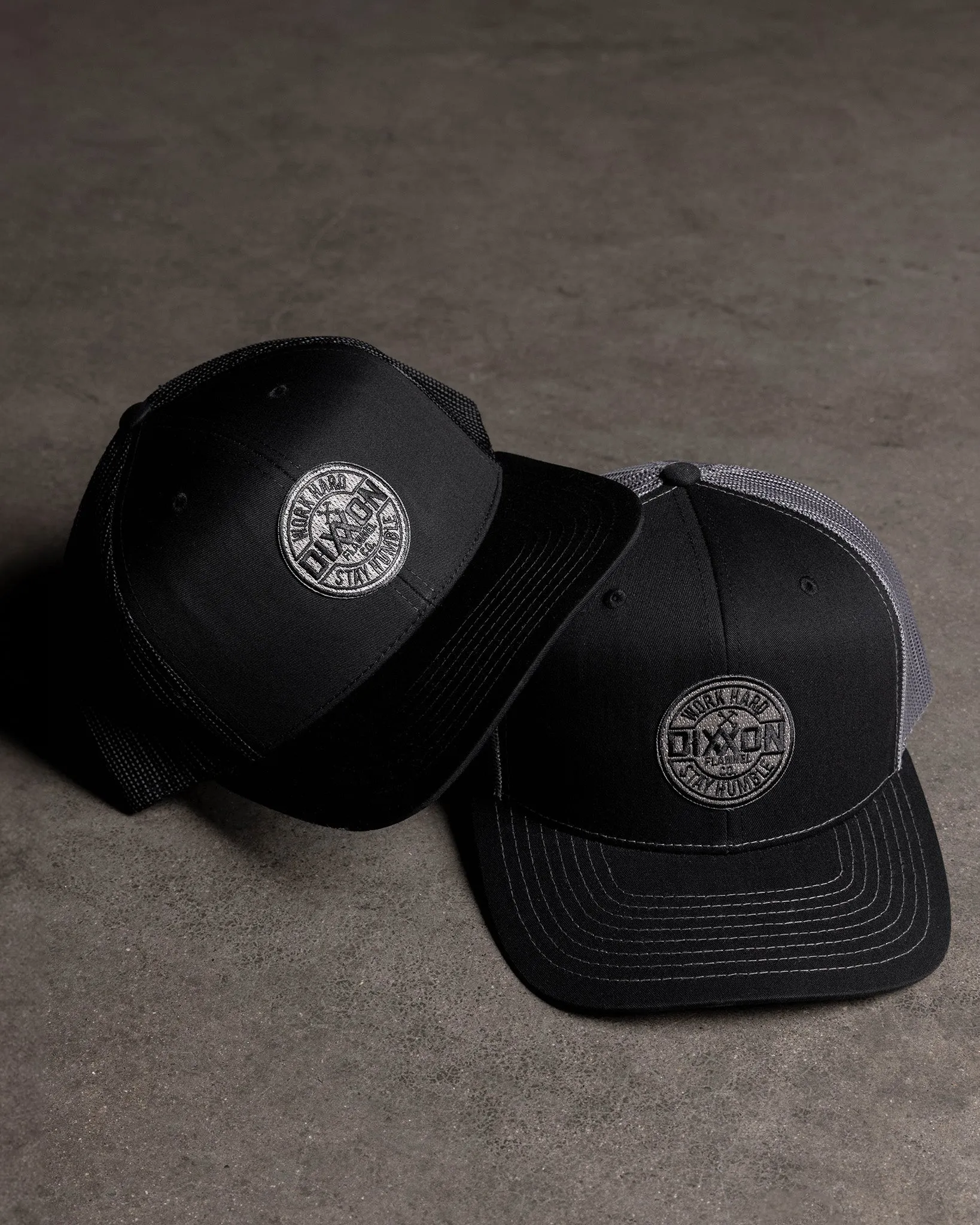Corpo Curved Bill Trucker Snapback - Black & Gray sold by Dixxon