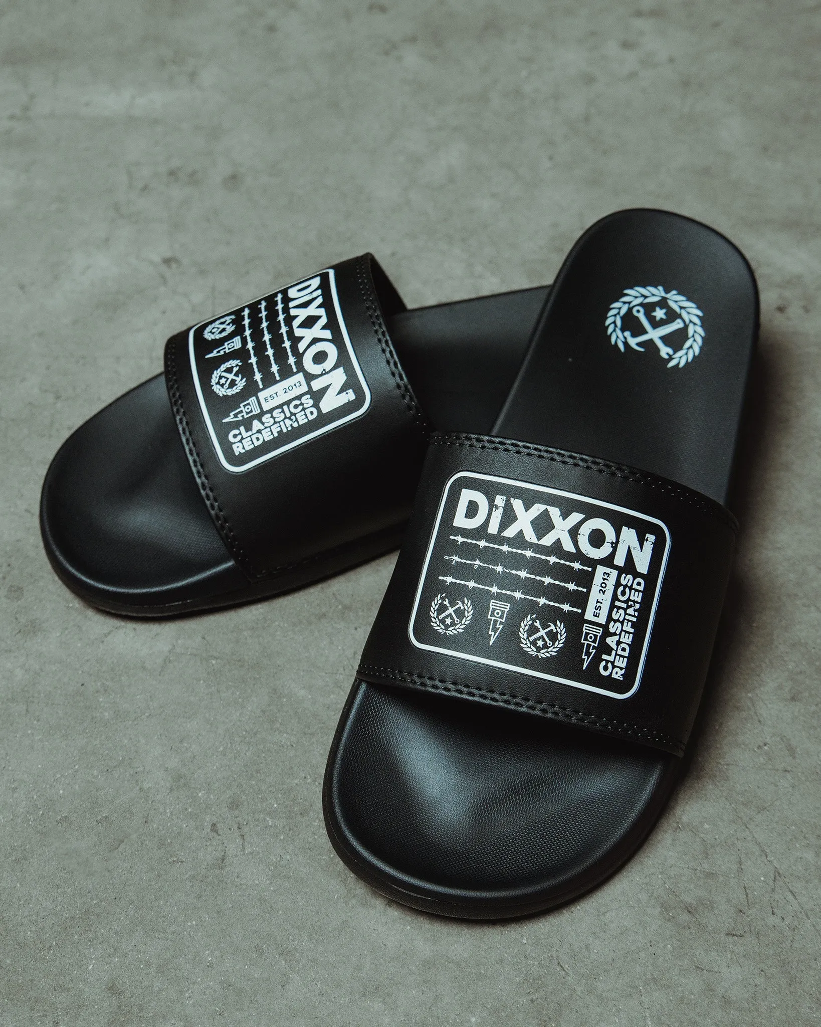 Barbed Slides - White & Black sold by Dixxon