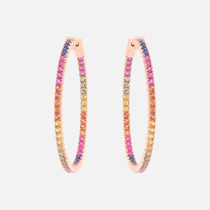 Colored sapphires and diamond hoops sold by Djula