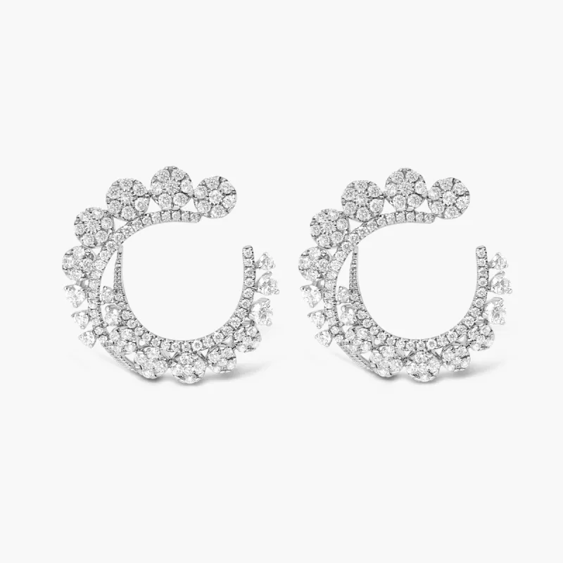 Swirl Earrings sold by Djula