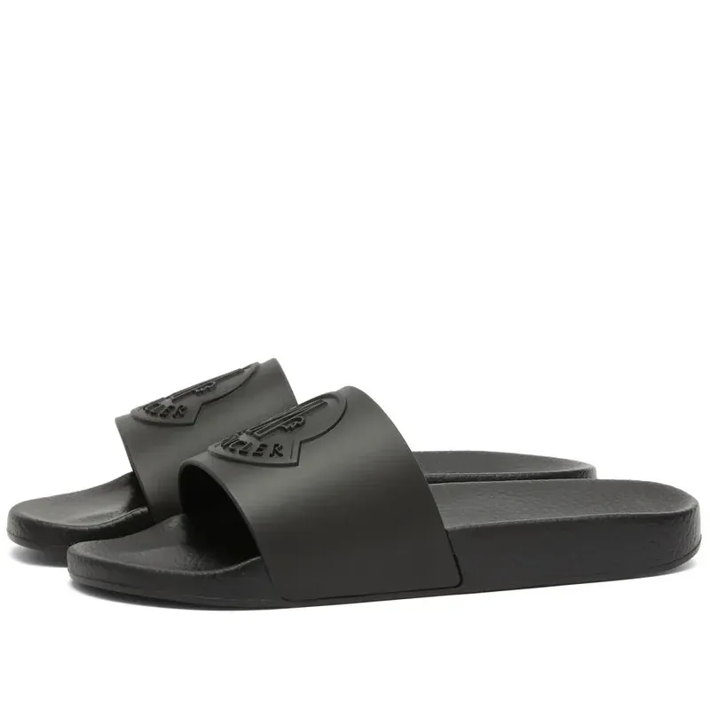 Moncler. Basile Logo Sliders sold by Klay UK