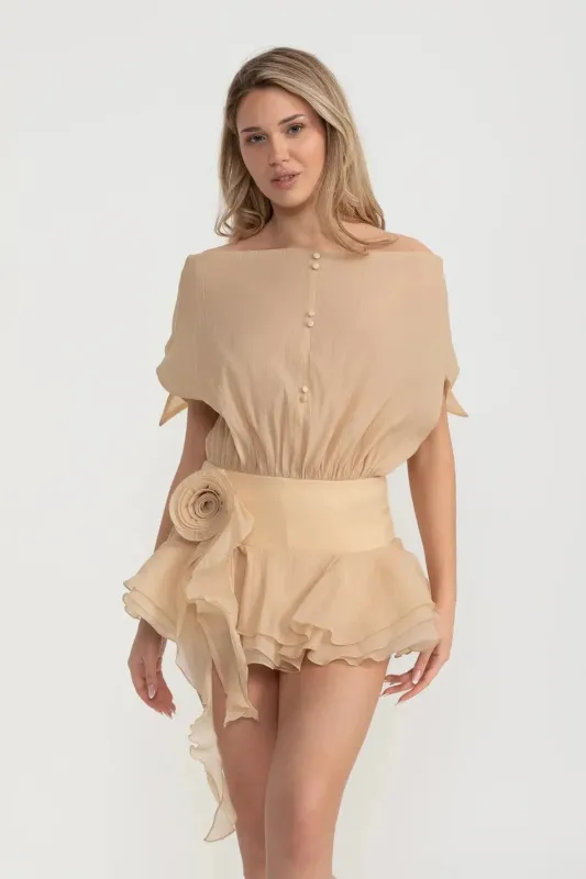 Elegant Mini Dress With Peplum Hem And Rosette Waist Embellishment - Beige made by Sierra darien