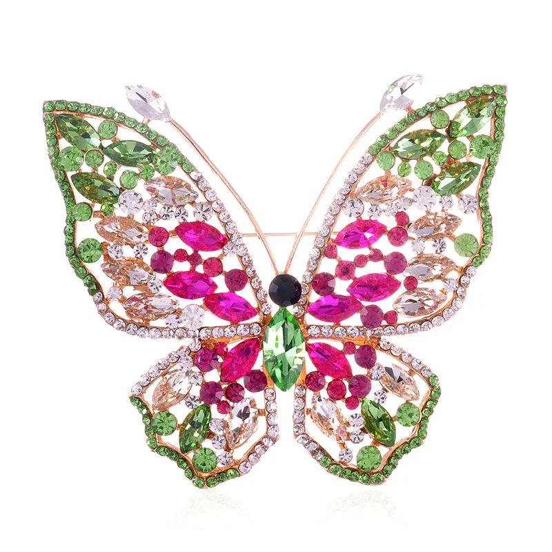 GOLD BUTTERFLY BROOCH FUCHSIA GREEN CLEAR STONES ( 1471 GNFU ) sold by Oh My Jewelry