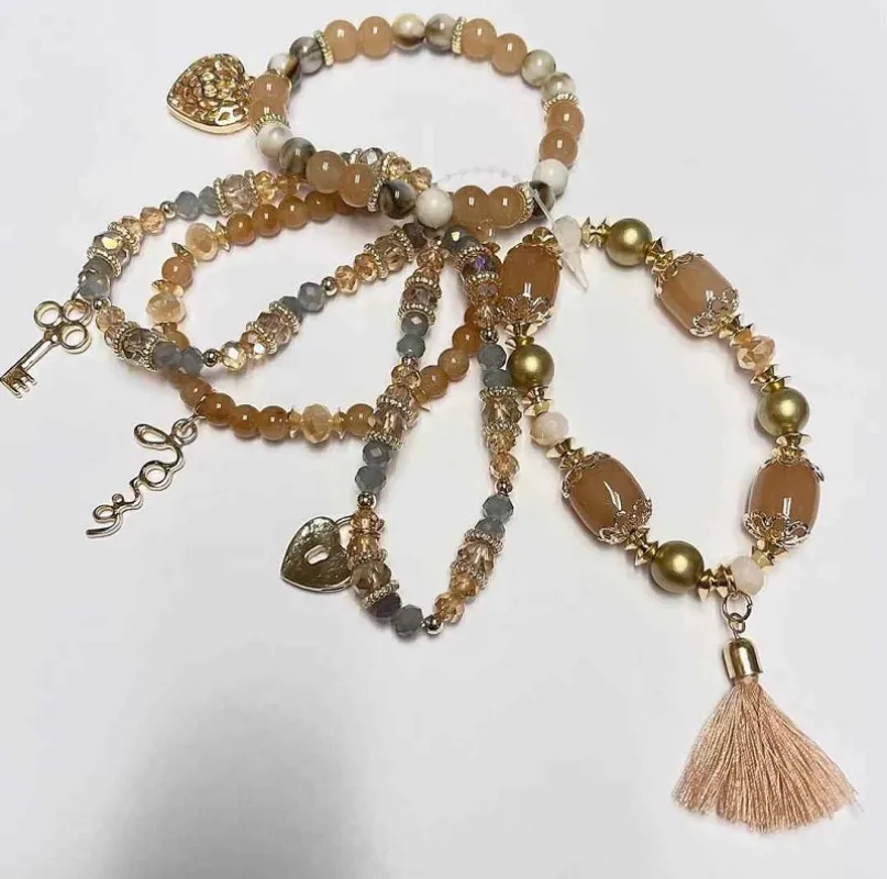 5 STRAND GOLD BROWN STRETCH CHARM BRACELETS ( 590 GBN ) sold by Oh My Jewelry