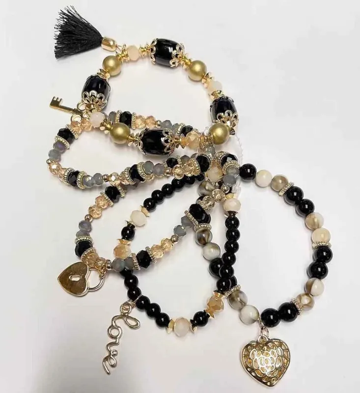 5 STRAND GOLD BLACK STRETCH CHARM BRACELETS ( 590GBK ) made by Oh My Jewelry