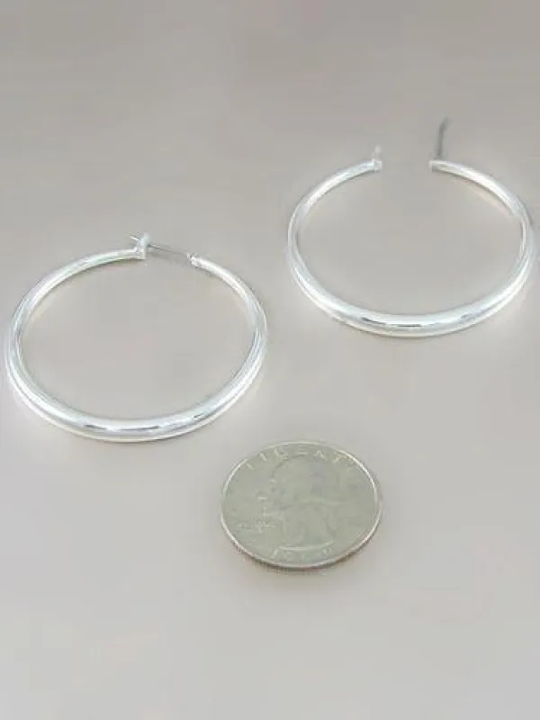 1 1/2" Silver Hollow Hoop Earrings ( 342 S ) made by Rebecca Minkoff
