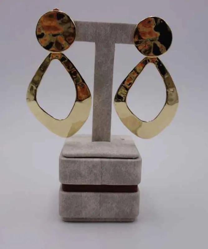 GOLD HAMMERED CLIP ON EARRINGS ( 2950 G ) sold by Oh My Jewelry