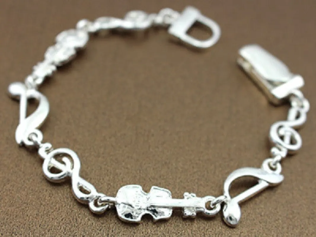 Silver Music Theme Instruments Magnetic Bracelet made by Oh My Jewelry