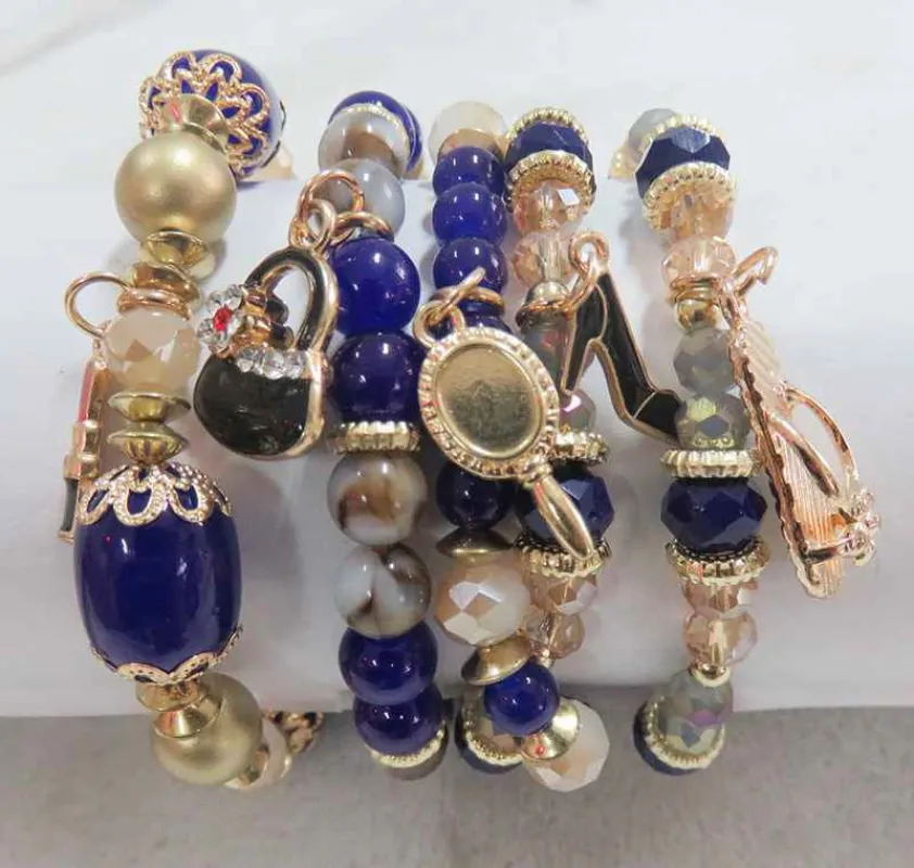 GOLD BLUE STRETCH BRACELETS BEAUTY CHARMS ( 5902 BL ) made by Oh My Jewelry