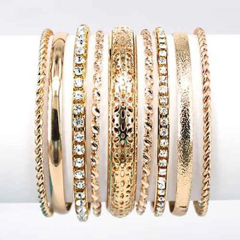 9 PIECE GOLD BANGLE SET ( 8005 GDCLR ) sold by Oh My Jewelry