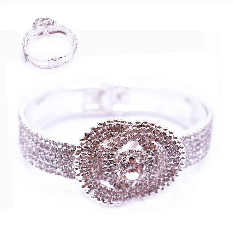 INFINITY SYMBOL SILVER BANGLE CLEAR STONES ( 12474 S ) sold by Oh My Jewelry