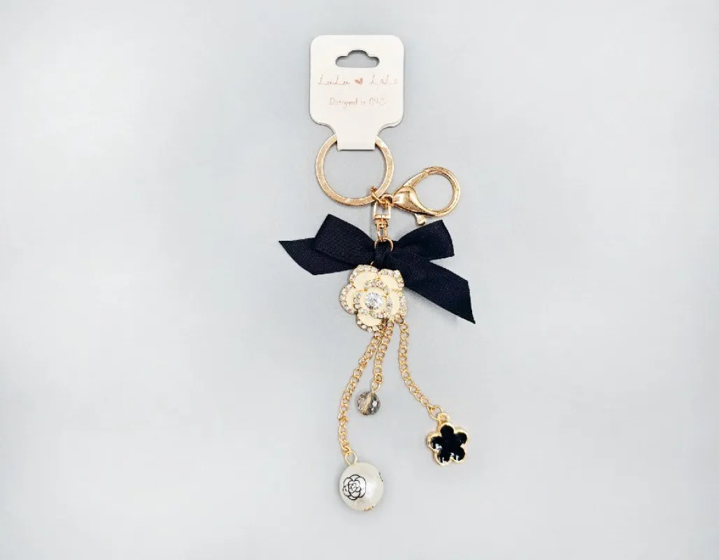 FLOWER TASSEL KEYCHAIN ( 1729 WHT ) sold by Oh My Jewelry