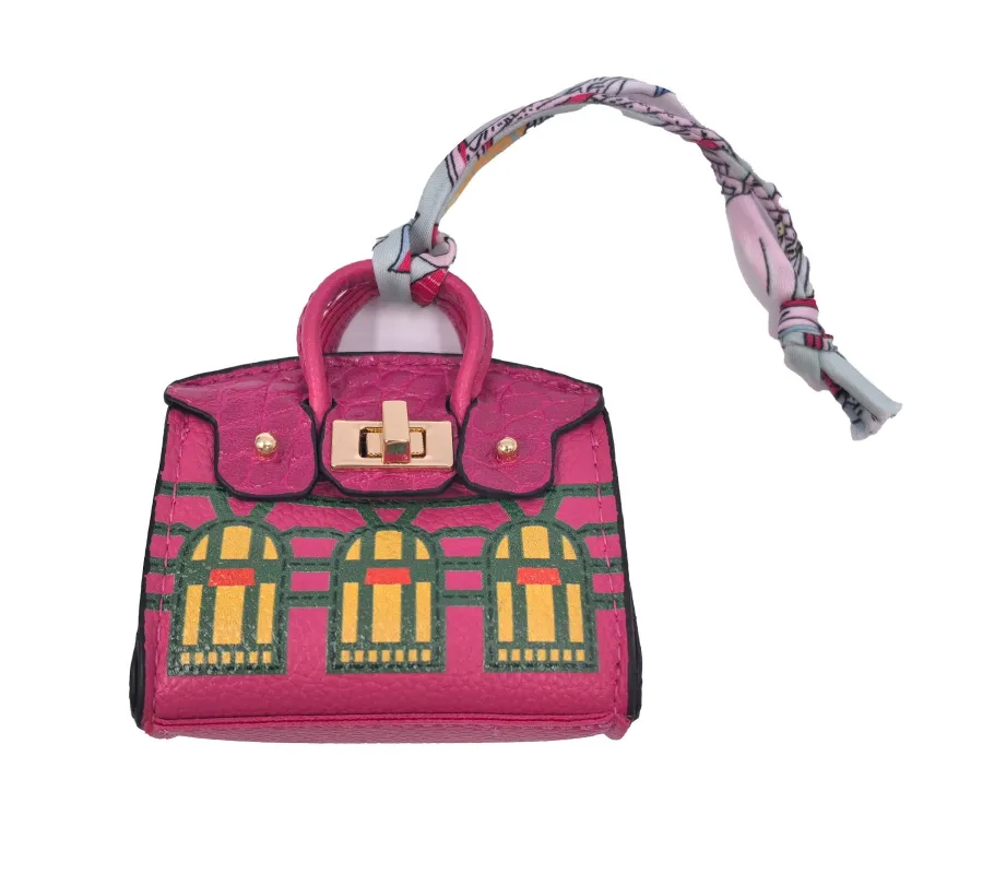 FUCHSIA CHARM BAG ( 0363 FU ) sold by Oh My Jewelry