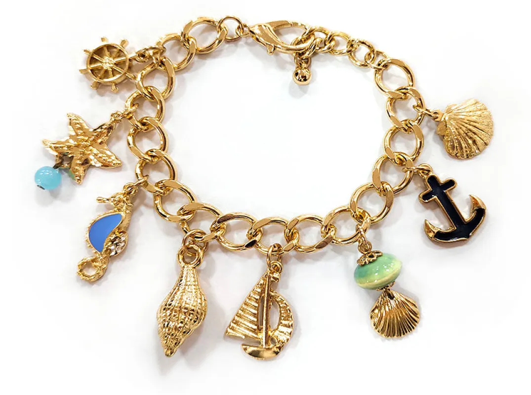 GOLD BRACELET SEA LIFE CHARMS ( 8977 GDMT ) sold by Oh My Jewelry