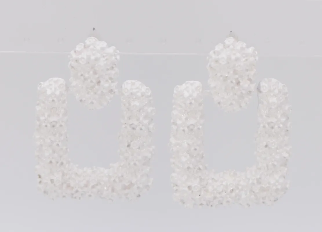 WHITE METAL EARRINGS ( 3206 WHT ) sold by Oh My Jewelry