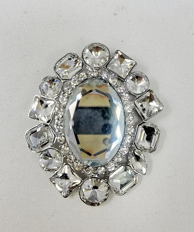 OVAL SILVER BROOCH CLEAR STONES ( 10015 RCL ) sold by Oh My Jewelry
