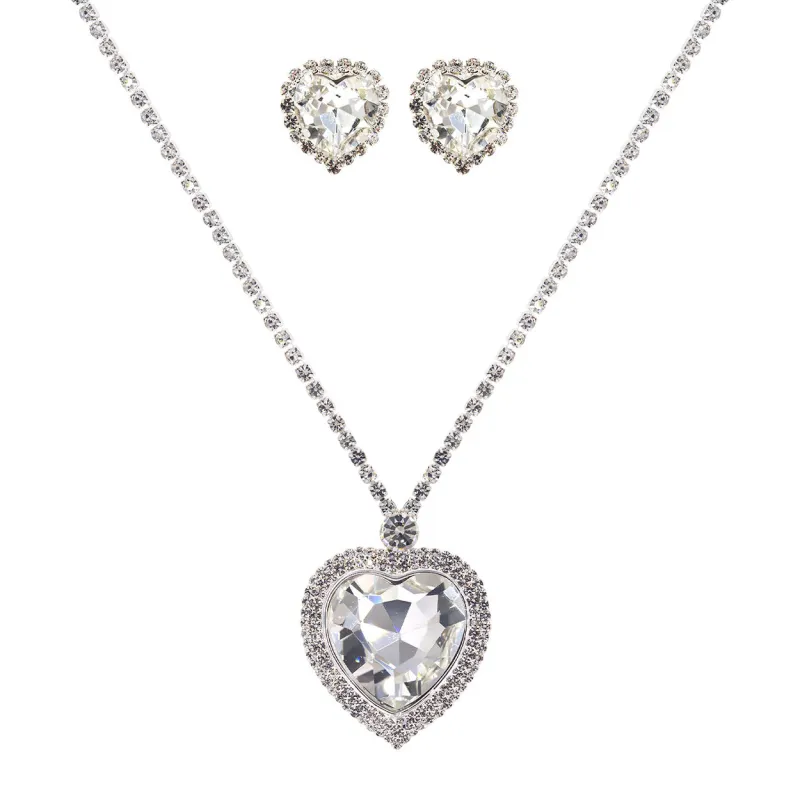 SILVER HEART NECKLACE SET CLEAR STONES ( 18373 VCRS ) sold by Oh My Jewelry