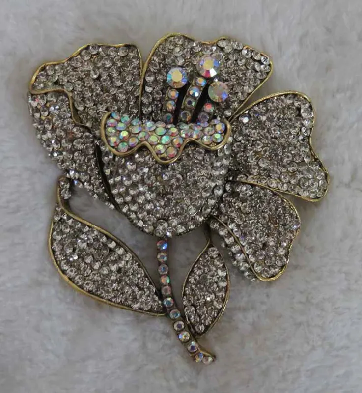 GOLD FLOWER BROOCH CLEAR STONES ( 2970 GCL ) sold by Oh My Jewelry