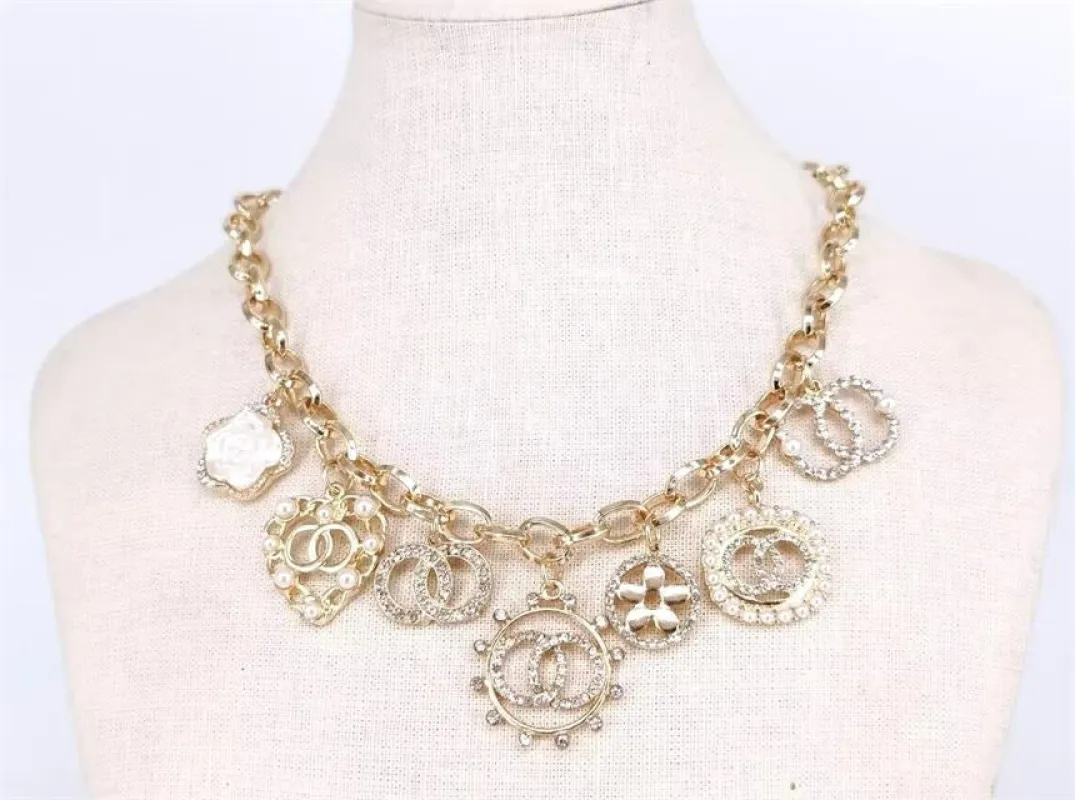 GOLD NECKLACE DANGLING CHARMS ( 2441 GDCRCL ) sold by Oh My Jewelry